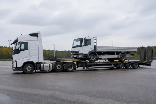 Illustrative overland vehicle transport arrangement